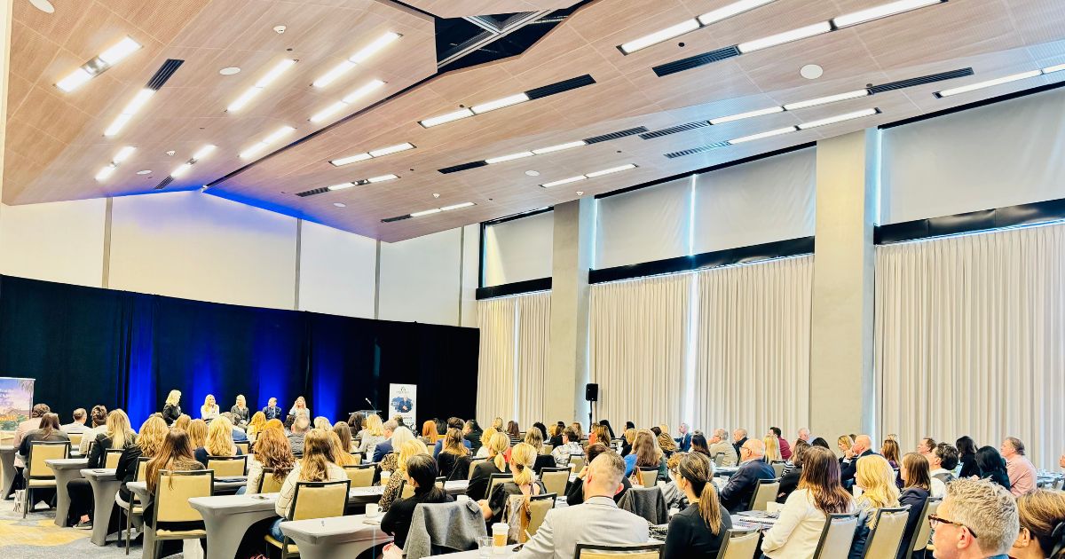 room full of sotheby's international realty agents